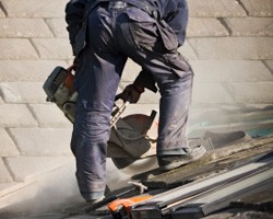 Roofer with work clothing on